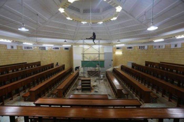Renovation work inside the auditorium at Yangon University’s Hlaing campus (Photo- Kyi Naing)
